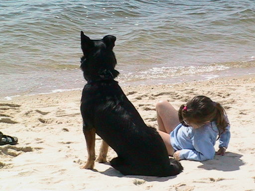 Sheida being loyal with a little friend by the water.