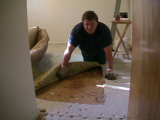 Pulling up carpet in baby's room before we can even begin...