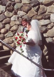 Mike and Donna climb the stairs to the reception.