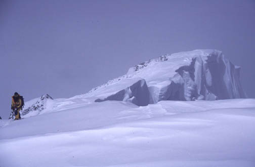 Ryszard approaching the summit with the Kangshung face dropping off on the right.