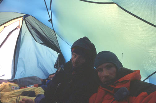 Ryszard and Jacek in the tent at camp 3 after Ryszard's epic descent from 
	the summit.  Note Ryszard's black, frost bitten nose. (self portrait)