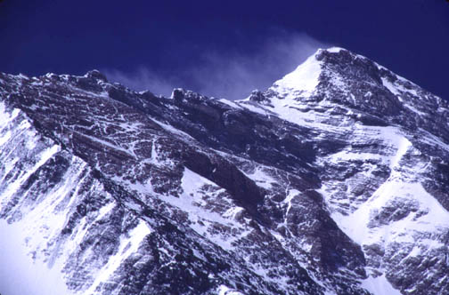 The north east ridge of Everest with the first, second and third steps clearly
	visible.