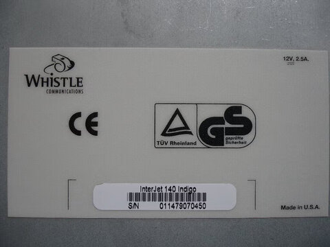 Bottom label of an InterJet 140 Indigo: S/N 011479070450, 12V 2.5A, CE and TUV Rheinland GS marks, Made in U.S.A.