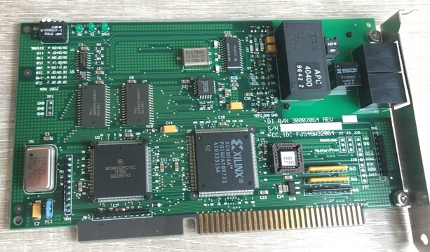 The Digi DataFire ISA1ST ISDN card, component side: Motorola 68302, Xilinx XC4004A, two RJ-45 jacks.