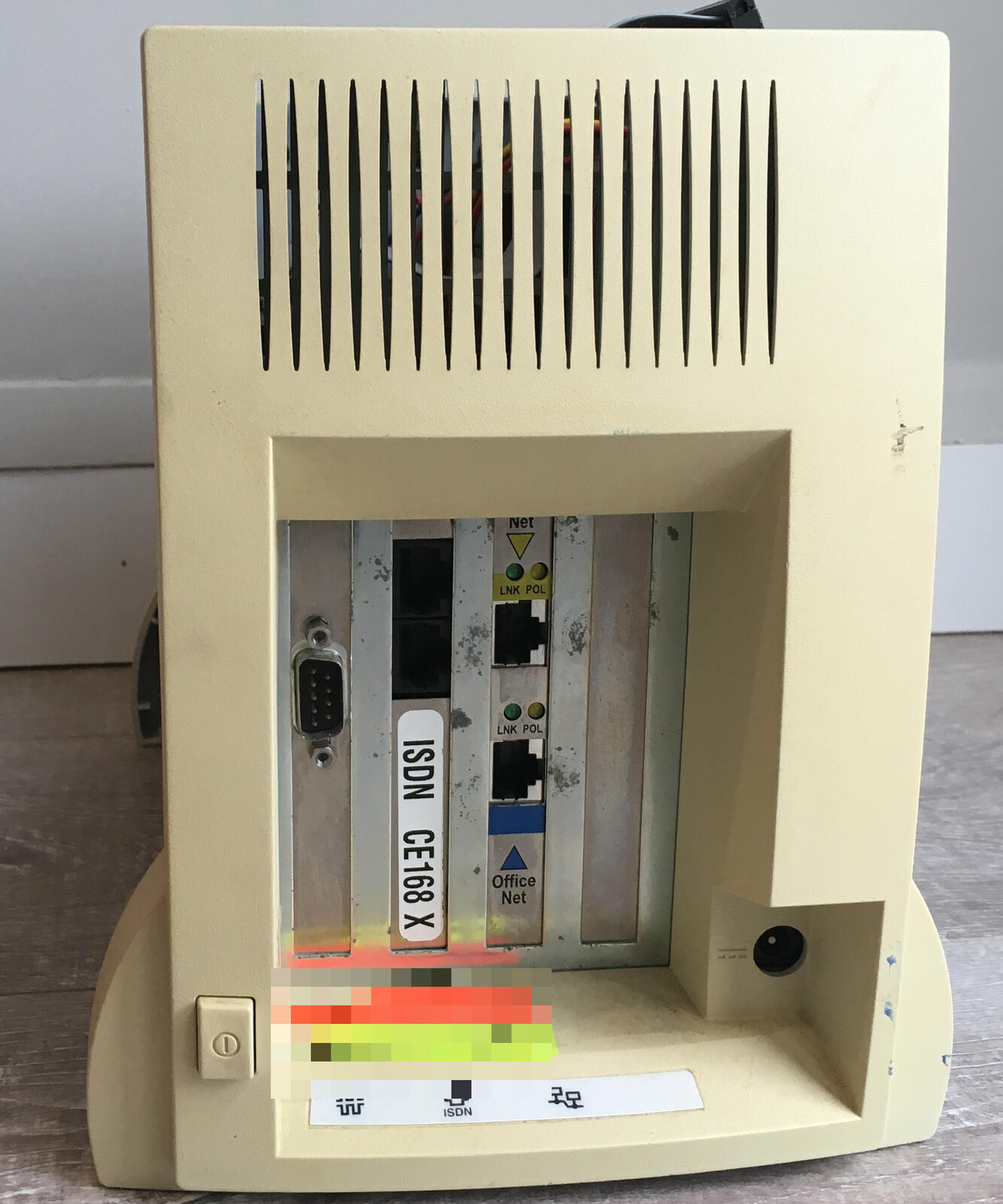 The rear of the InterJet with the ISDN card's bracket, labeled ISDN CE168 X, and an ISDN icon on the port label strip.
