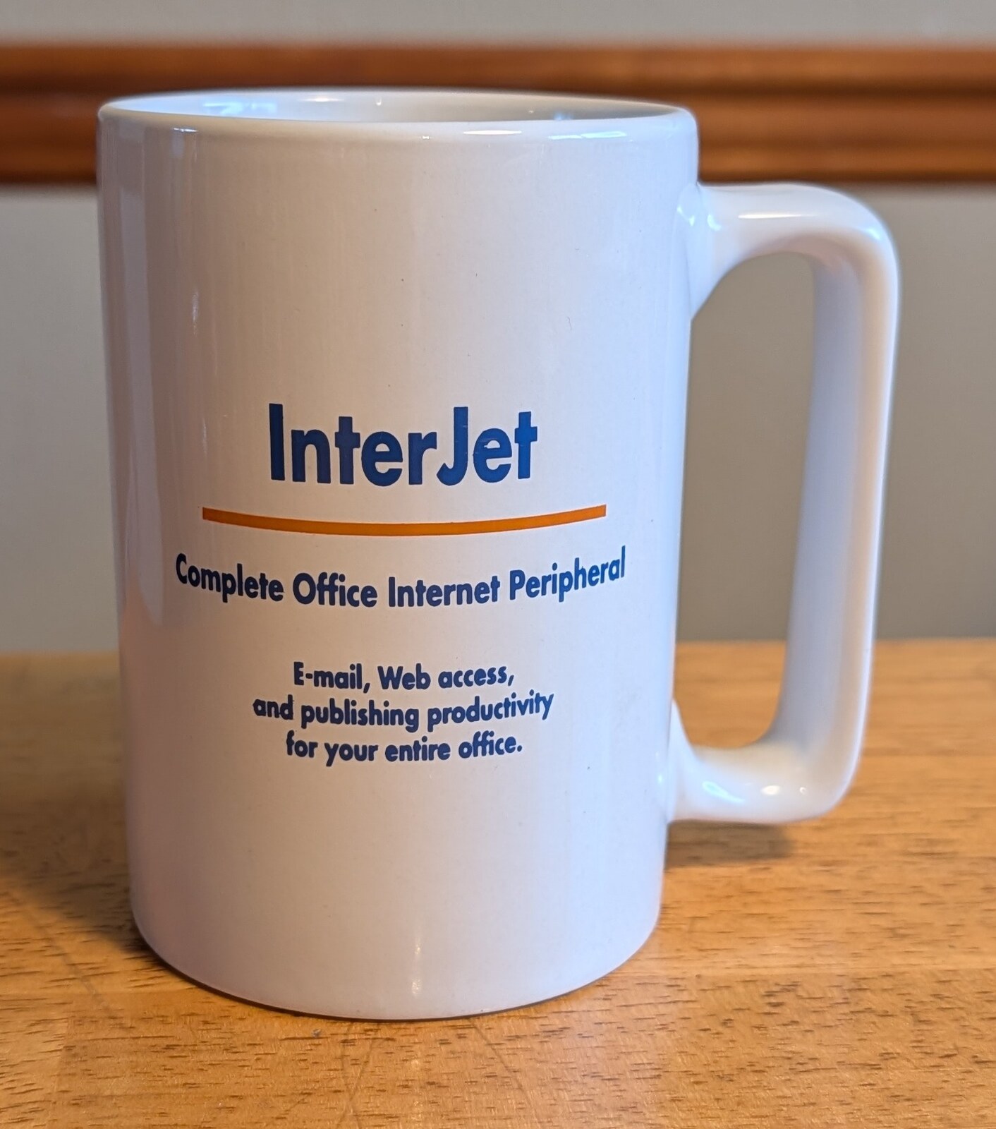 The original Whistle mug, back: InterJet, Complete Office Internet Peripheral. E-mail, Web access, and publishing productivity for your entire office.