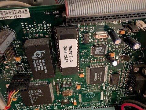 The boot ROM on the mainboard, labelled 7621012-3 3498 2AEE.