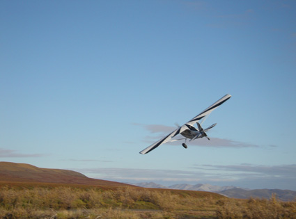 Doug flying away from the Wulik River